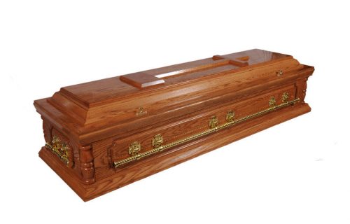 A solid American oak casket in a medium shade with full length panel and high gloss finish. Fitted with solid full length twist metal bar handles and high quality white interior.